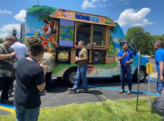 employees having fun at Dimpex Thermal Solutions, Kona Ice on hot day, employee appreciation